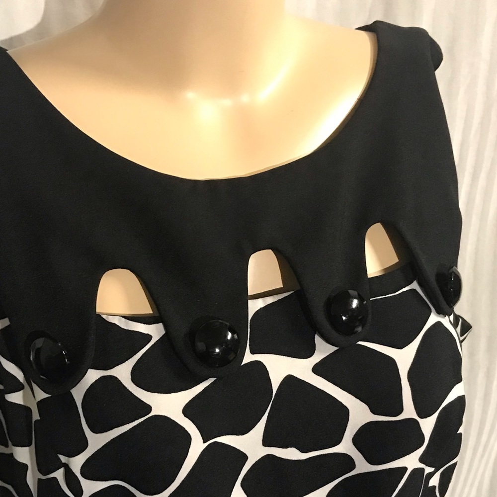 Peephole Neckline. Animal Print dress